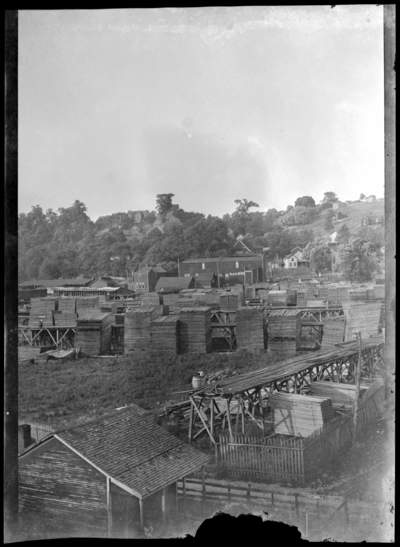 View of stacks of lumber at mill