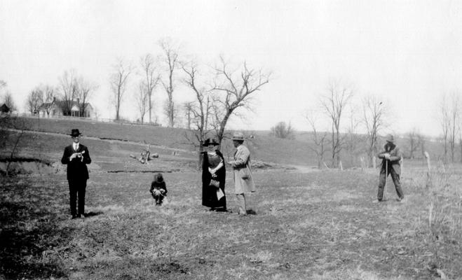 Near view of middle of 'piece of low ground remarkable for English grass,' on Grassy Lick Creek in Montgomery County, KY. People and house in view