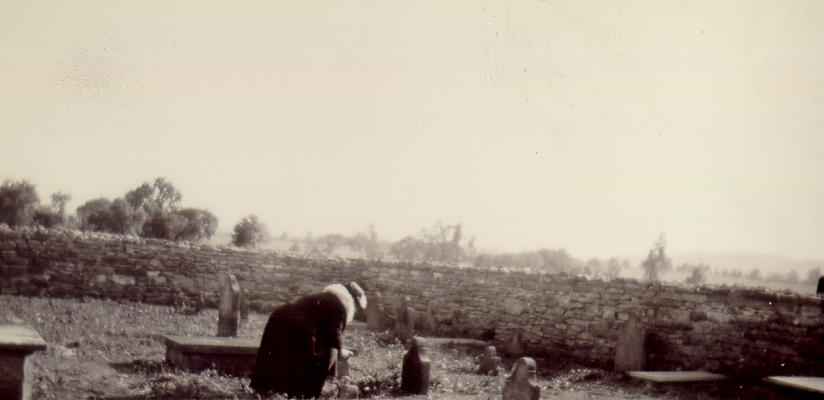 Woman in a cemetery