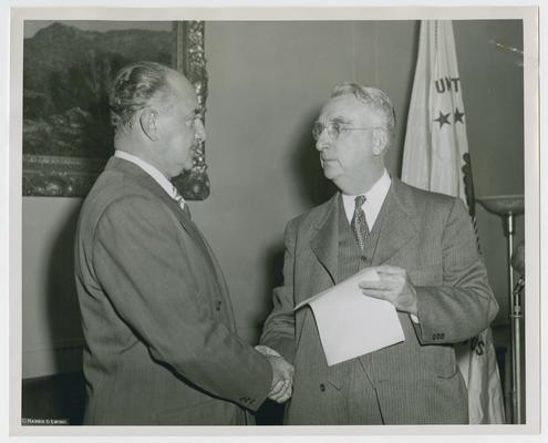 Vinson with Edmond Reek of Twentieth Century-Fox Movietone News