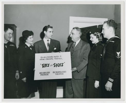 Secretary Vinson with military personnel at premiere of Tars and Spars at the Metropolitan Theater