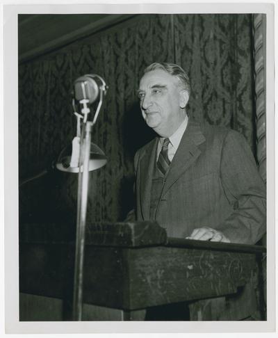 Secretary Vinson at speaker's podium