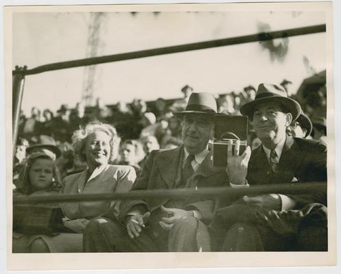 Chief Justice Vinson and Postmaster General Hannegan watch a St. Louis Cardinals baseball game. Inscribed