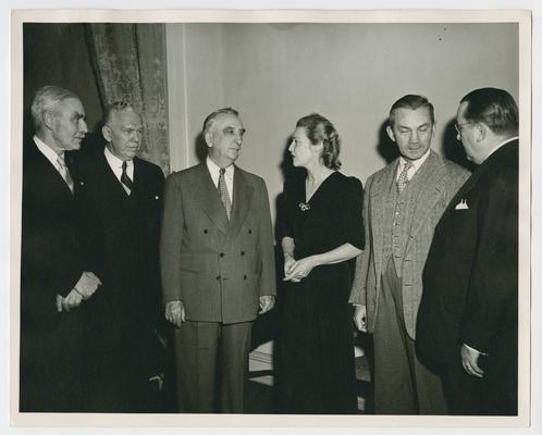 American Red Cross Campaign Fund of 1948. Left to right: Joseph G. Grew, District of Columbia Red Cross Fund Drive Chairman; George Marshall, Secretary of State; Chief Justice Vinson; Madeleine Carroll; James Forrestal, Secretary of Defense; and Basil O'Connor, president of the American Red Cross