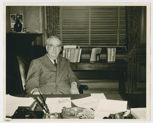 Chief Justice Vinson at his office desk