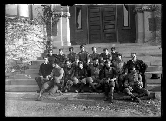 Football team on steps of Health Building (old Chemistry Building)