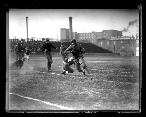 Football action, University of Kentucky versus University of Louisville