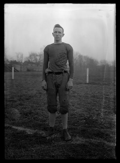 Football player on top of field, Abe Roth