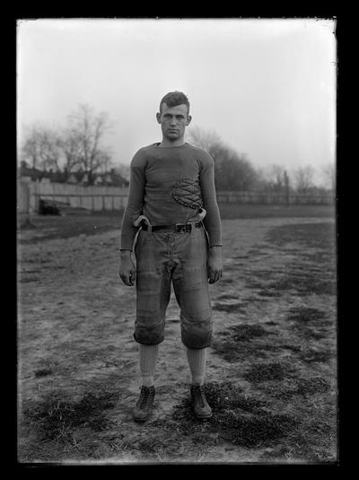 Football player on top of field