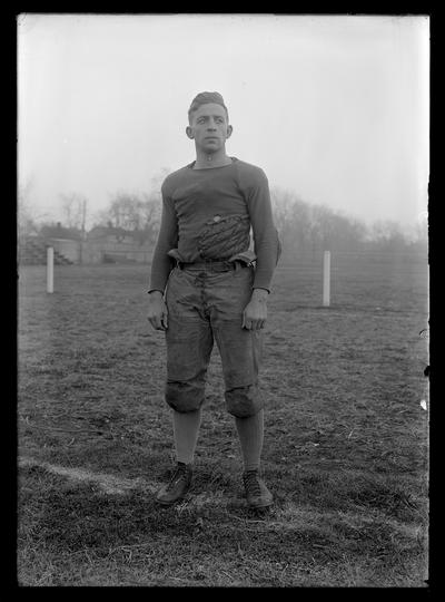 Football player on bottom of field