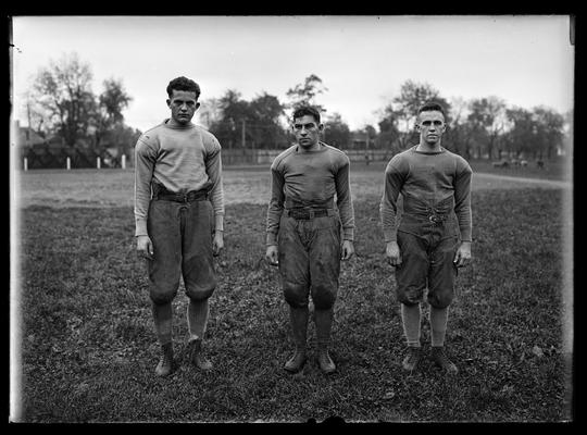Football players in threes, unidentified