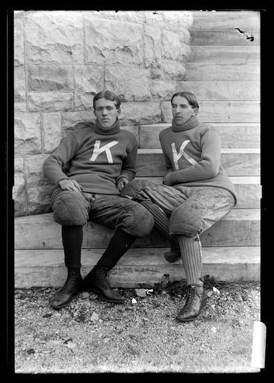 Notation Track athletes, John Willim and Elliot, about October 1898, seated on steps of Miller Hall, turtle neck sweaters, K's
