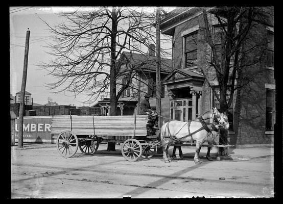 Lumber yard, office, load of lumber