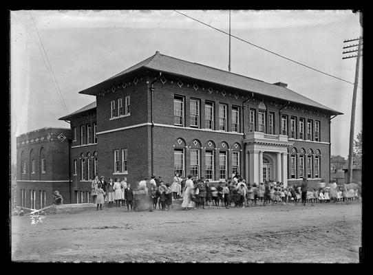 Lincoln School, side and front, some persons blurred