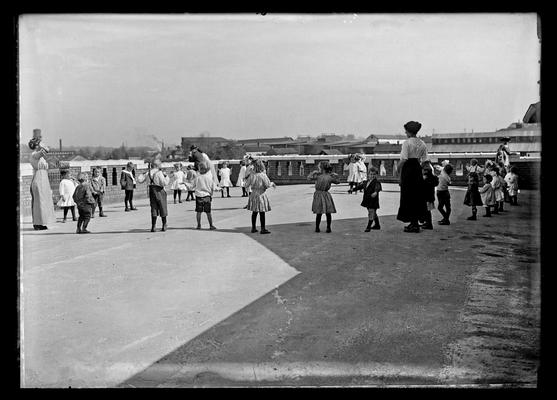 Lincoln School, health exercises on roof, two women, children, for Mrs. Breckinridge