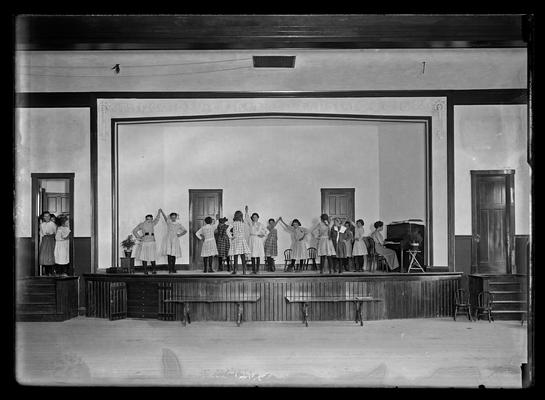 Lincoln School, practicing on stage for program, for Mrs. Breckinridge