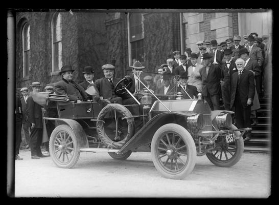 William Jennings Bryan and party leaving in auto, Administration Building (Main Building)