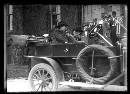 William Jennings Bryan in auto in front of main building