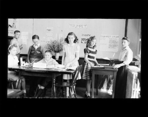 Junior High school students at work on newspaper