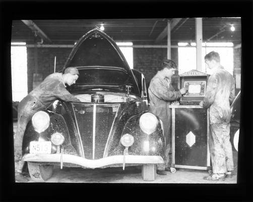 Students working on automobile