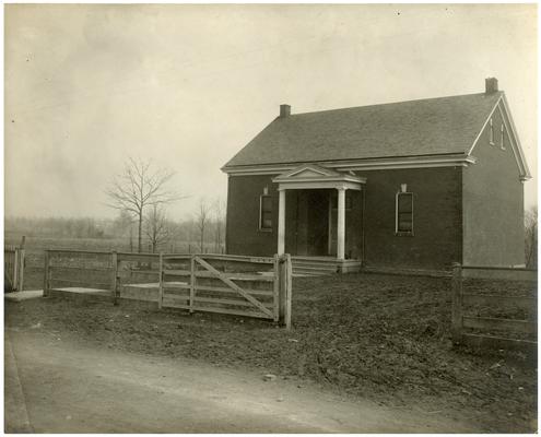 Exterior of the Loradale school house. Handwriting on verso (Four copies)