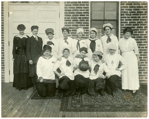 Group portrait of Picadome girls' basketball team with Nannie Faulconer (1865?-1940). Handwriting on verso. (Three copies)