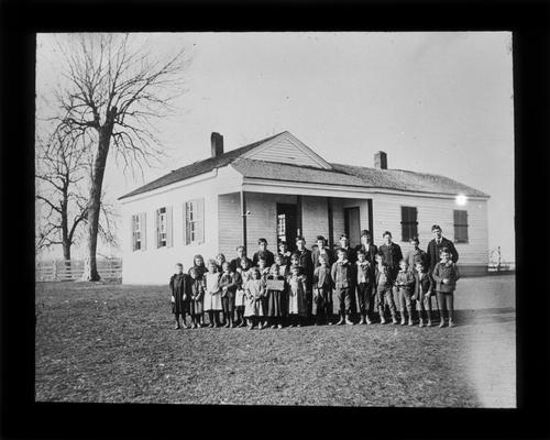 Students outside Alberti School at Chilleburg with Henry M. Gunn, teacher