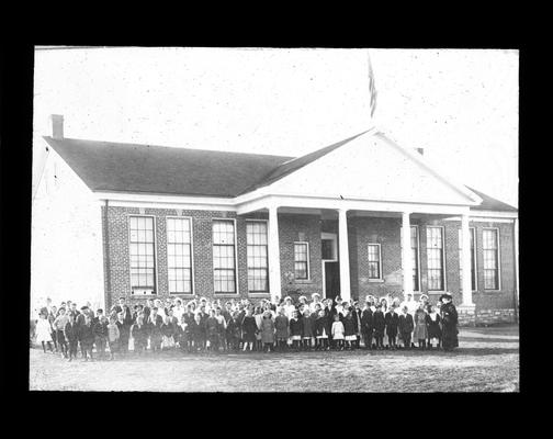 Students stand outside Athens School