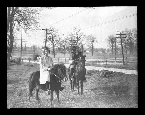 Students on ponies they rode to school