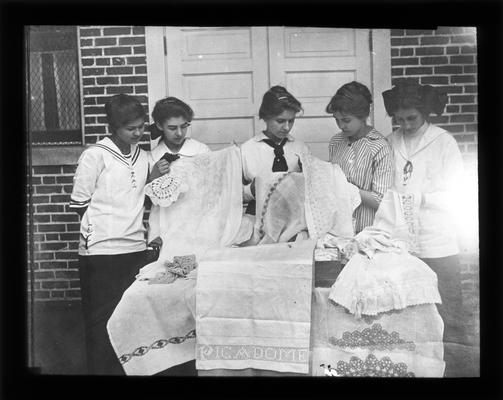 Picadome girls admire their handiwork. One is Mrs. Marjorie (Weeks) Karsner