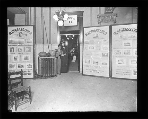 Bluegrass Child Posters on display outside school fair exhibits