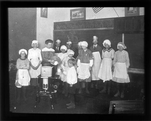 At Elmendorf school Miss Ella Ford serves soup to a student