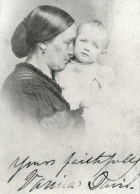 Woman with infant; handwritten in ink on the front 