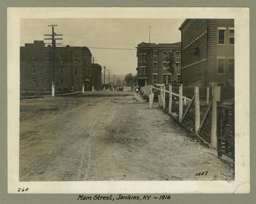 Title handwritten on photograph mounting: Main Street--Jenkins, Kentucky