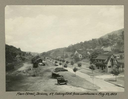 Title handwritten on photograph mounting: Main Street, Jenkins, Kentucky looking East from warehouse