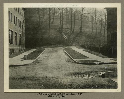 Title handwritten on photograph mounting: Street Construction--Jenkins, Kentucky