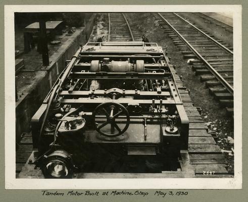 Title handwritten on photograph mounting: Tandem Motor Built at Machine Shop