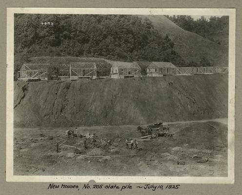 Title handwritten on photograph mounting: New houses, No. 205 slate pile