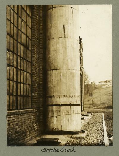 Title handwritten on photograph mounting: Smoke Stack