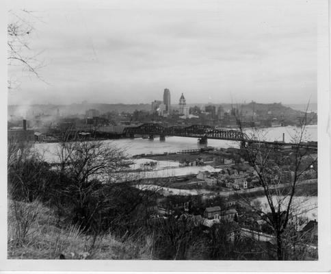 Flooded section of Covington. Netherlands Plaza Building in center background, 1937