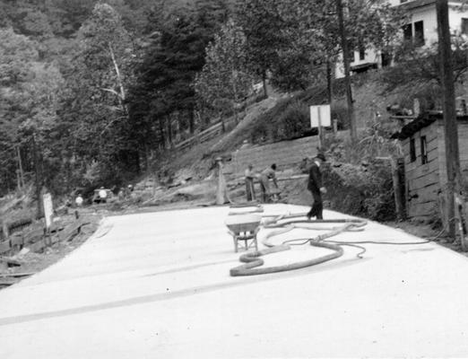 Project #918 District 5: The reconstruction and resurfacing with concrete of five streets in Whitesburg, KY. Completed section of a concrete street. View photographed October 10, 1936