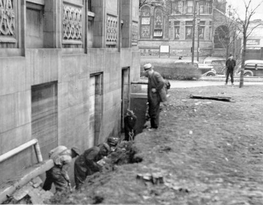 1937 Flood. WPA workers repairing a cave-in on the north side of the Louisville Free Public Library. View was photographed February 8, 1937