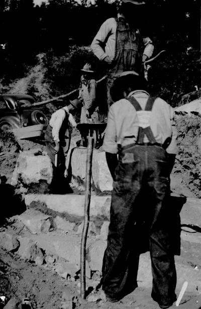 Project #101 District 4: Constructing native stone box culvert on the Cow Creek Road. This is a typical mountain 