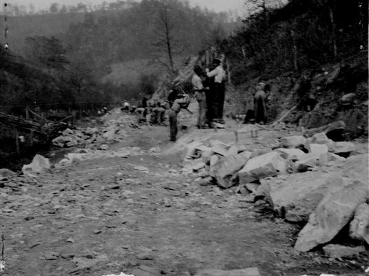 Project #36 District 5: Construction of highway, including grading, draining and surfacing, beginning on State Highway Route No. 40 on Buck Creek at Beauty, KY, a distance of two miles. Removing earth and rock cut, Beauty to Buck Creek, down to Elm Creek