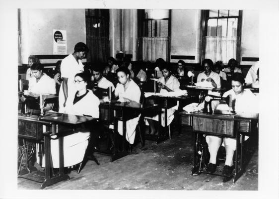 Project #205 District 6: Sewing room of colored Training Work Center, Louisville, KY. Photographed December 4, 1935