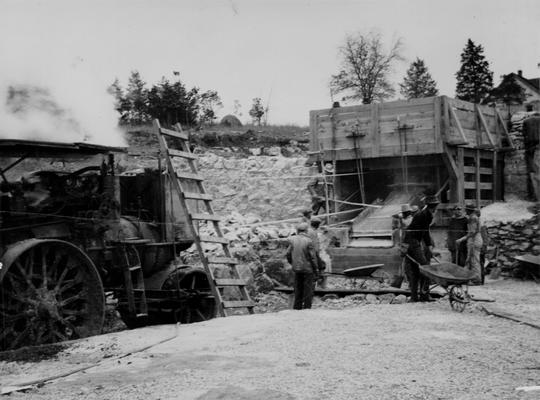 Project #486 District 1: Construction of cement bound macadam streets, 27' wide and extending for a total distance of approximately 1380' in the City of Princeton, KY. Crusher in operation, producing limestone for use in constructing new cement bound macadam streets at Princeton. Crusher furnished by City of Princeton. Photographed December 12, 1935