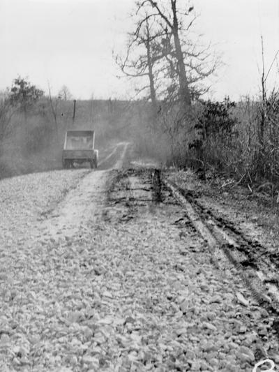 Project #343 District 3: Resurfacing and reconstruction of Point Pleasant-Franklinton Road from Highway No. 37 to Franklinton via Point Pleasant. This road, formerly having a traffic bound macadam surface, is being scarified and reshaped, with 3