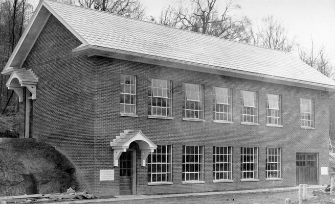 Project #2443 District 1: Industrial Arts Building, Hawesville, KY. A high school farm shop and home economics building has been erected at Hawesville, KY, through the agency of Project #2443, which was completed November 29, 1936. Completed farm shop and home economics building. View photographed December 23, 1936