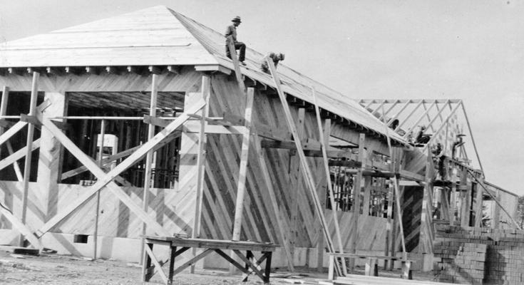 Project #3008 District 1: Project #3008 is the construction of a six-room brick veneer school building at Hickory Grove, KY. View shows roofing and sheathing work for the proposed brick veneer school. Photograph taken September 25, 1936