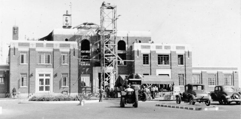 Project #2690 District 6: Construction of an addition to the Administrative Building at Bowman Field Airport, Louisville, KY, is nearing completion under Project #2690. The original structure may be seen at the left of the central part of the enlarged building. View photographed September 22, 1936